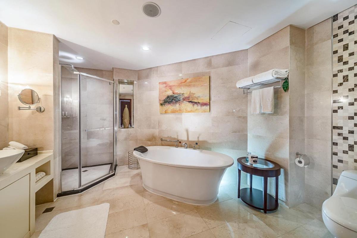 Haikou Mingguang Shengyi Hotel (Previous Mingguang International Hotel) - Housity