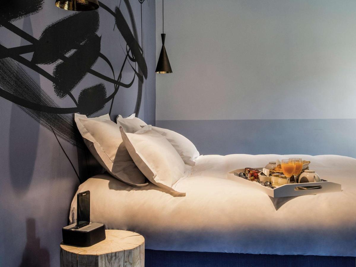 Un ou plusieurs lits dans un hébergement de l'établissement Jules César Hotel & Spa Arles - MGallery Collection