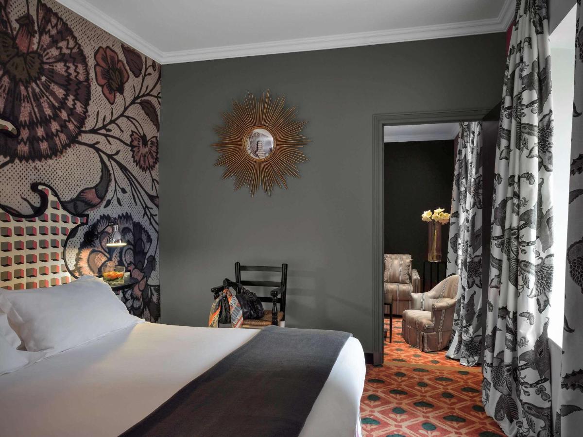 Un ou plusieurs lits dans un hébergement de l'établissement Jules César Hotel & Spa Arles - MGallery Collection