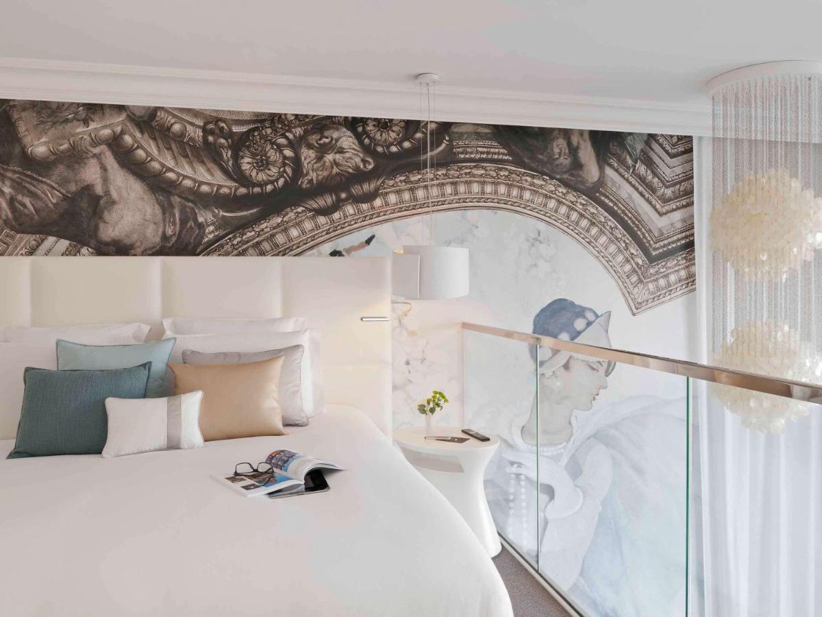 Un ou plusieurs lits dans un hébergement de l'établissement Cures Marines Hotel Thalasso & Spa Trouville - MGallery Collection