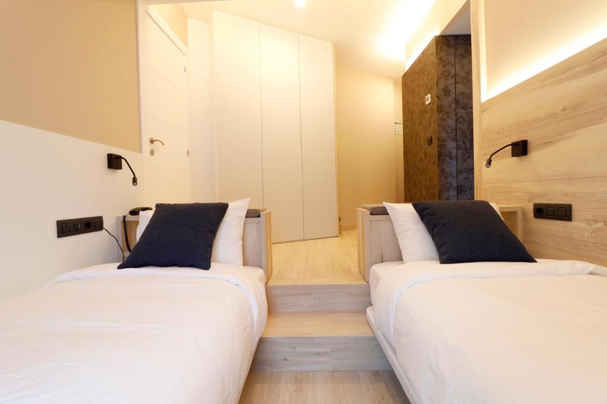 Cama o camas de una habitación en Hotel Montarto