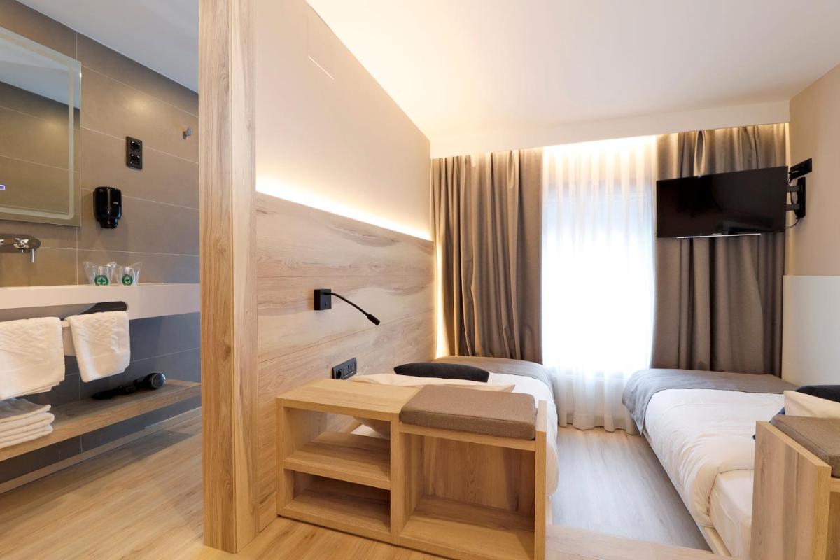 Cama o camas de una habitación en Hotel Montarto