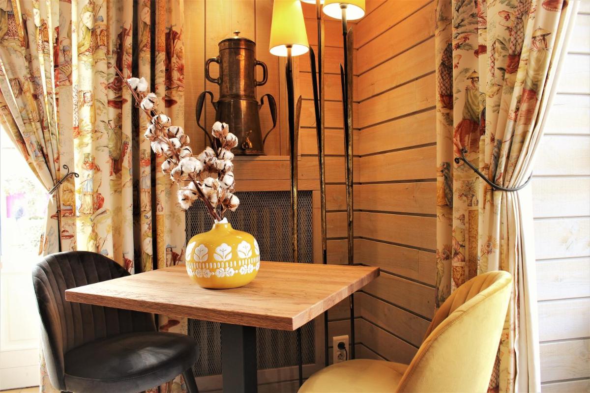 Coin salon dans l'établissement Le Bailliage Hôtel & Spa