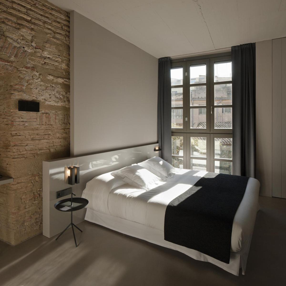 Cama o camas de una habitación en Caro Hotel