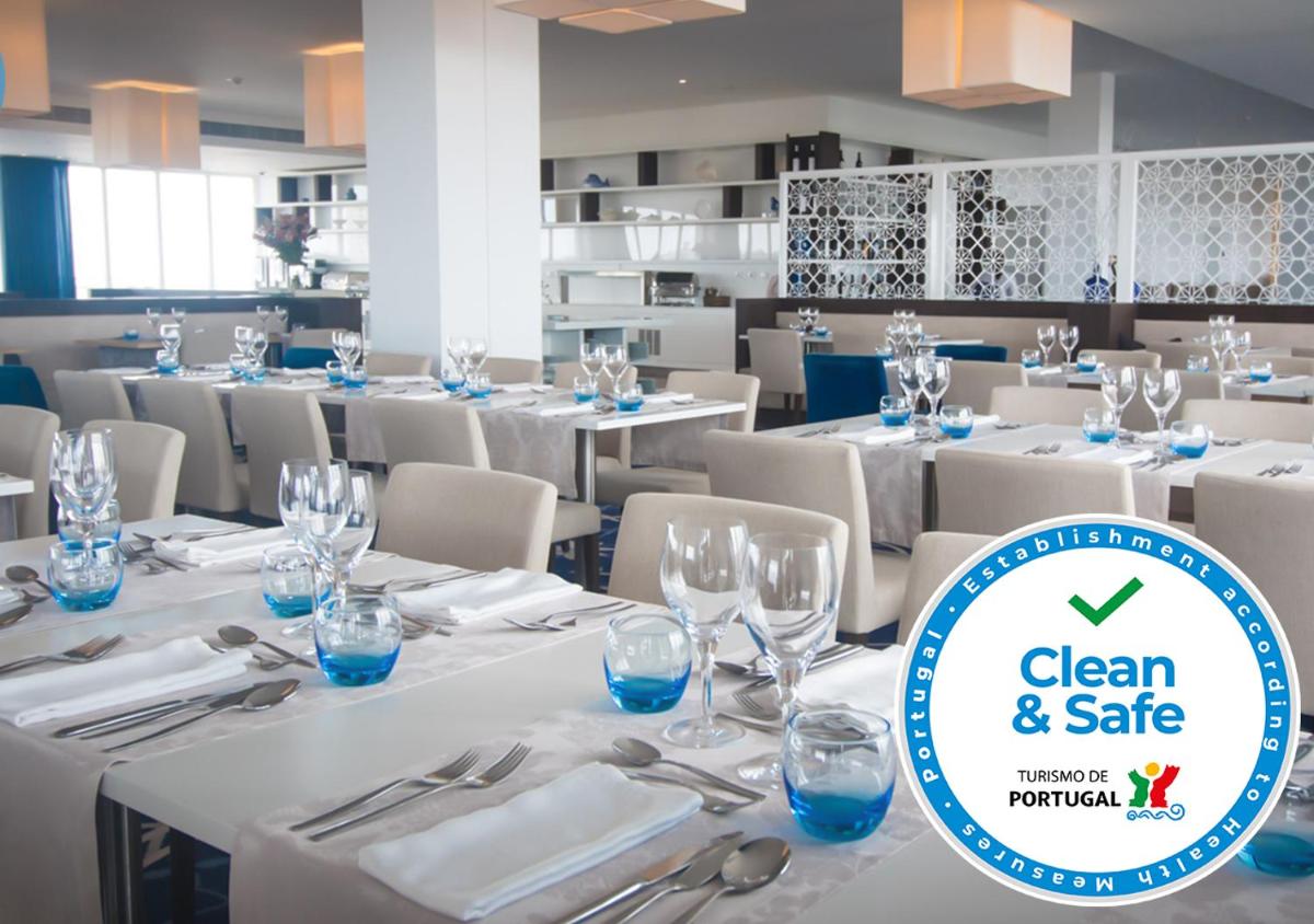 Um restaurante ou outro lugar para comer em MH Peniche