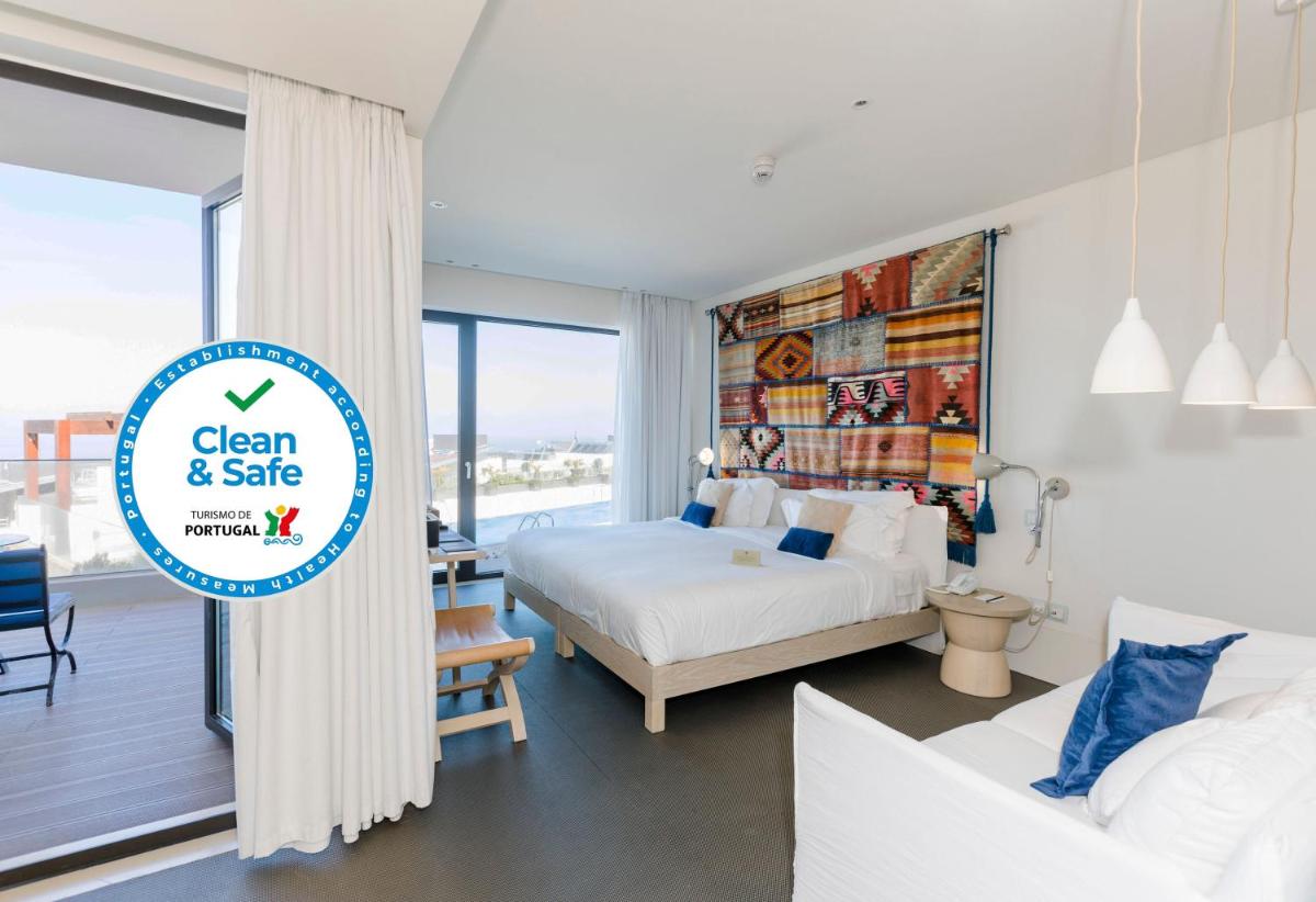 Uma cama ou camas num quarto em Royal Obidos Scenic Resort