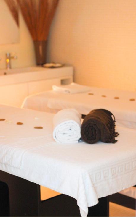 Uma cama ou camas num quarto em INLIMA Hotel & Spa