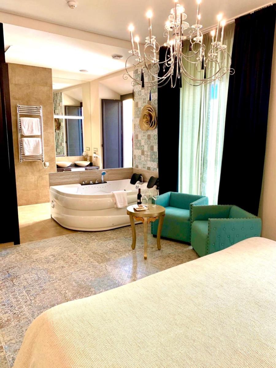 Cama o camas de una habitación en Akla Hotel Mérida