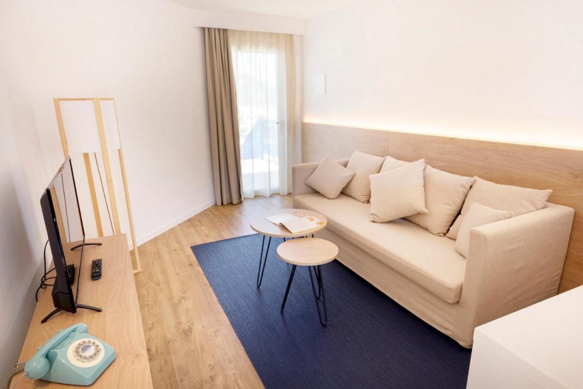 Zona de estar de Parque Nereida Suites Hotel