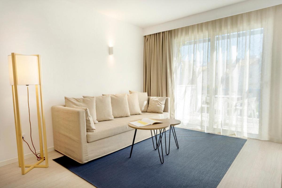 Zona de estar de Parque Nereida Suites Hotel