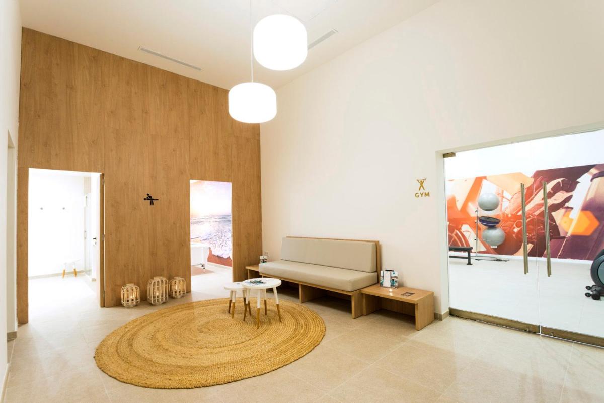 Zona de estar de Parque Nereida Suites Hotel