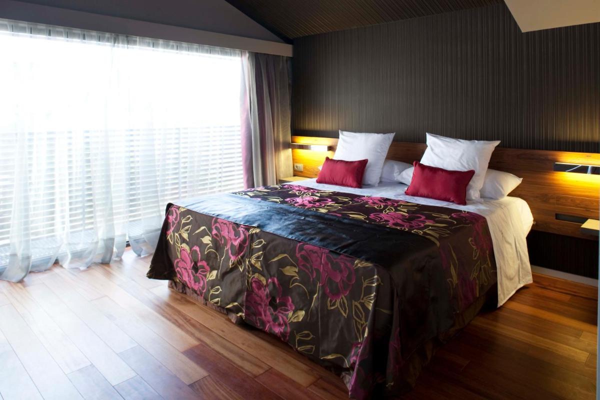 Cama o camas de una habitación en Hotel AF Pesquera