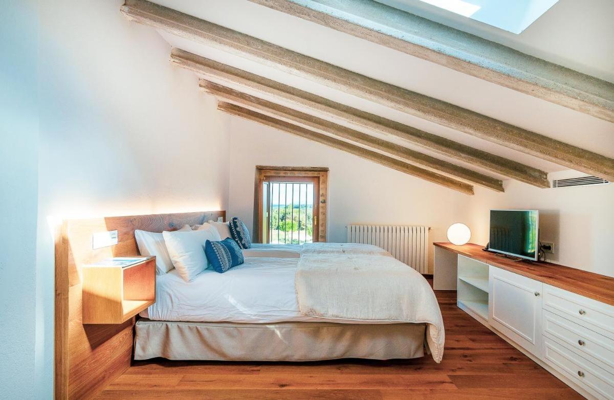Cama o camas de una habitación en Casa Anamaria Hotel