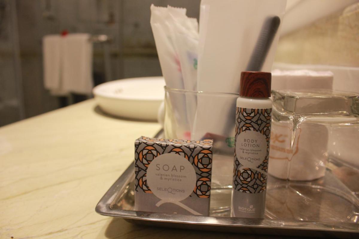 a tray with some cosmetics on a table at Savoy - IHCL SeleQtions in Ooty