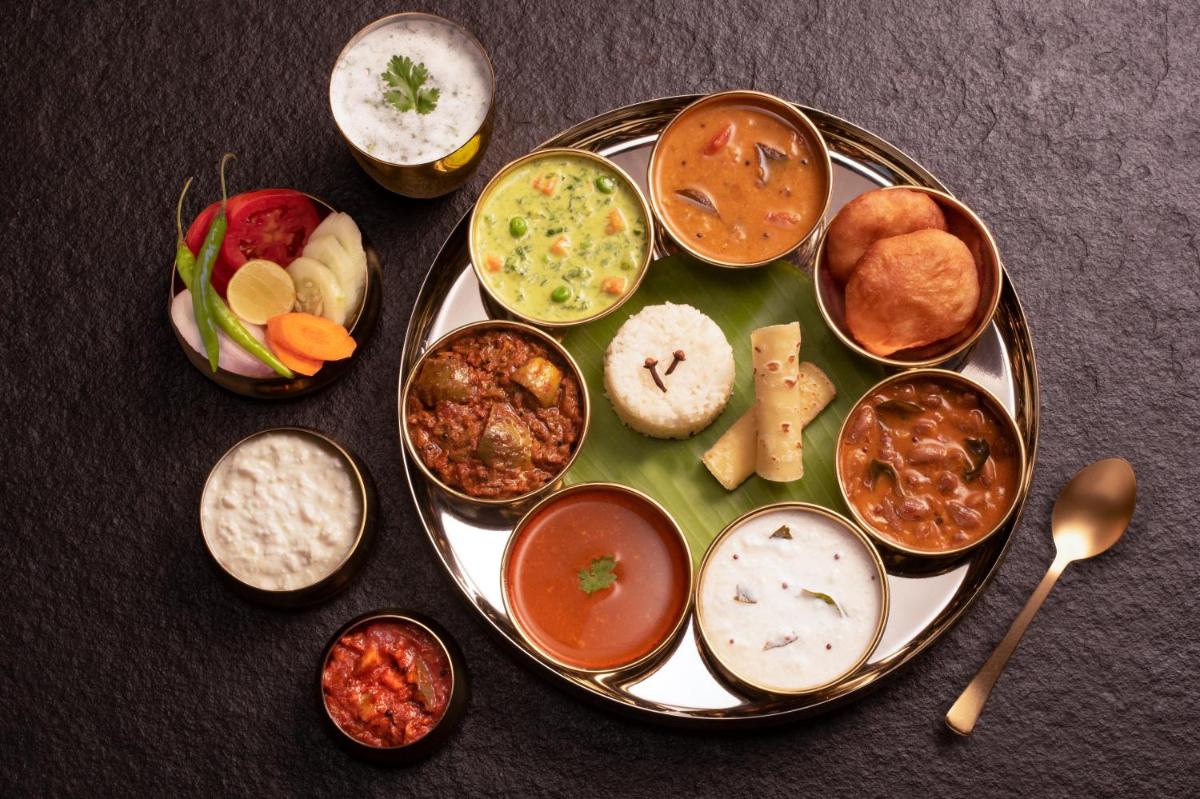 a plate of different types of food on a table at Savoy - IHCL SeleQtions in Ooty