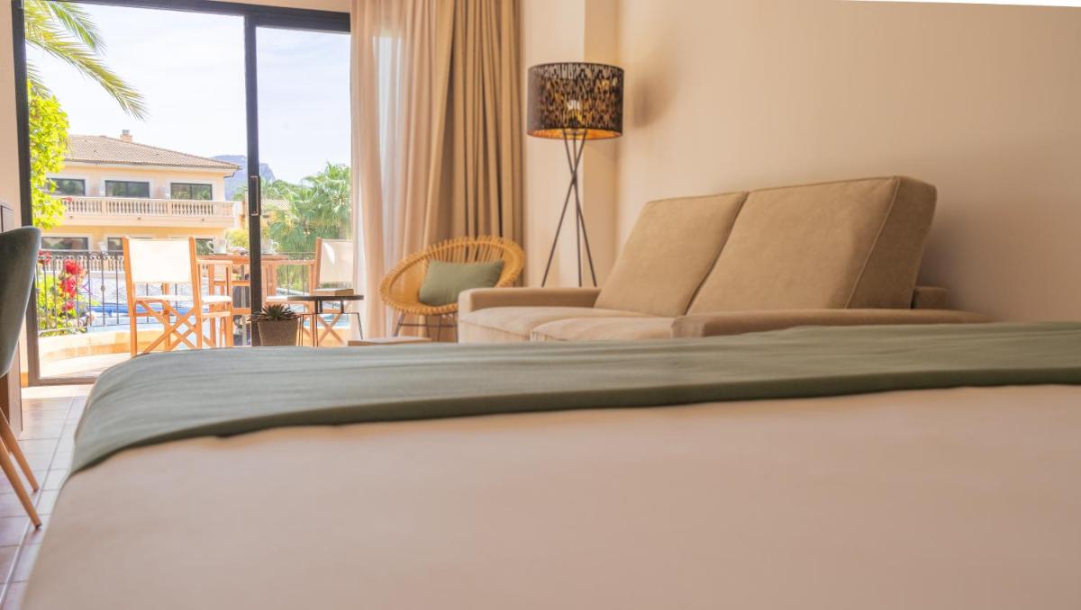 Cama o camas de una habitación en Mon Port Hotel & Spa