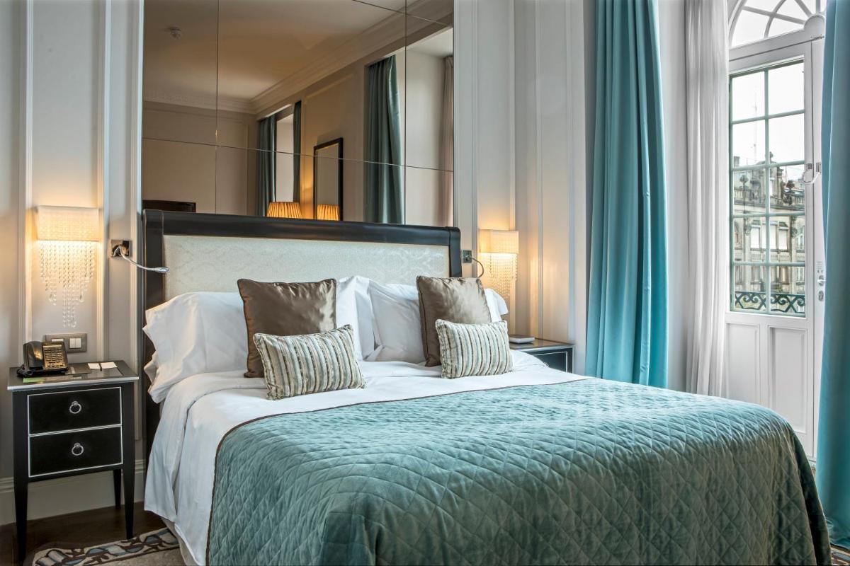 Uma cama ou camas num quarto em InterContinental Porto - Palacio das Cardosas by IHG