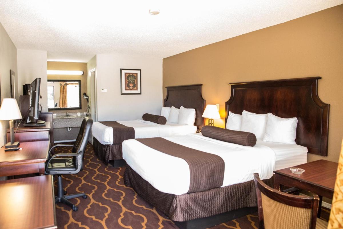 Mockingbird Inn & Suites - Housity