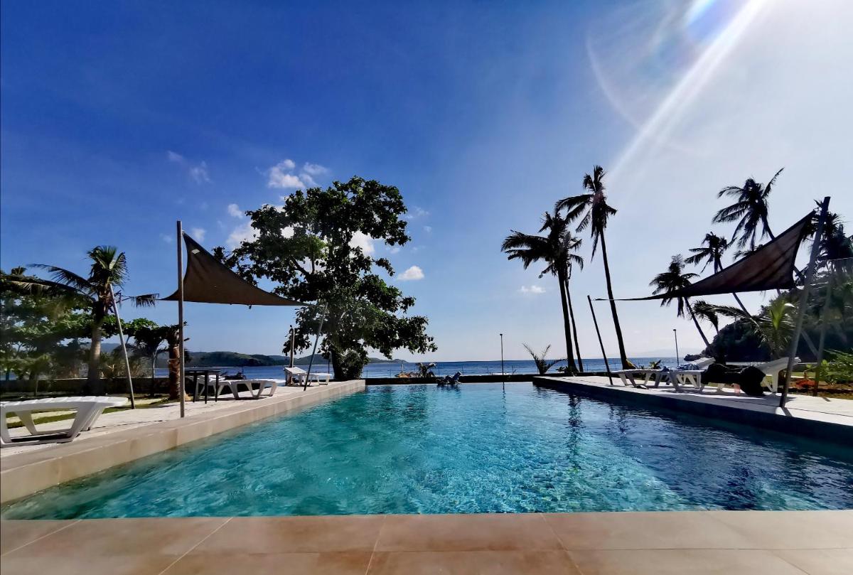 Sunset Cove Beach & Dive Resort - Housity