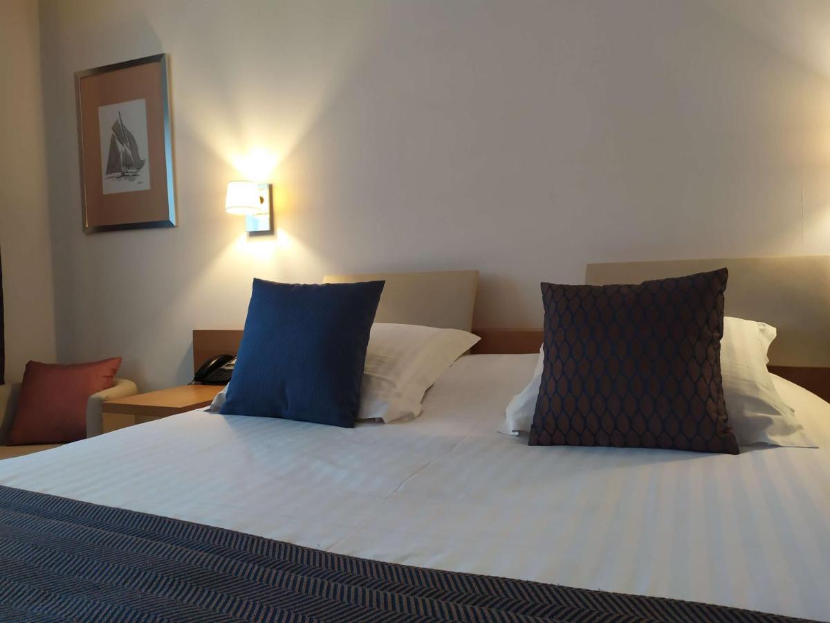 Un ou plusieurs lits dans un hébergement de l'établissement Best Western Premier Hôtel du Vieux-Port