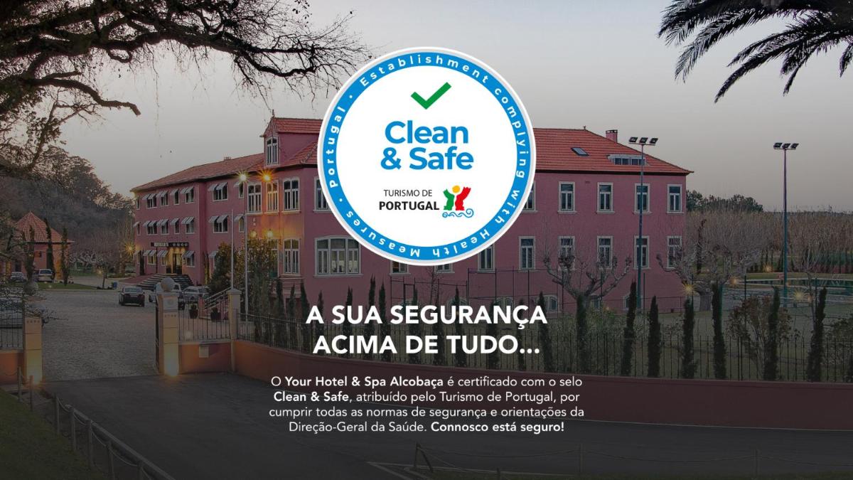 uma placa na frente de um prédio em Your Hotel & Spa Alcobaça em Alcobaça