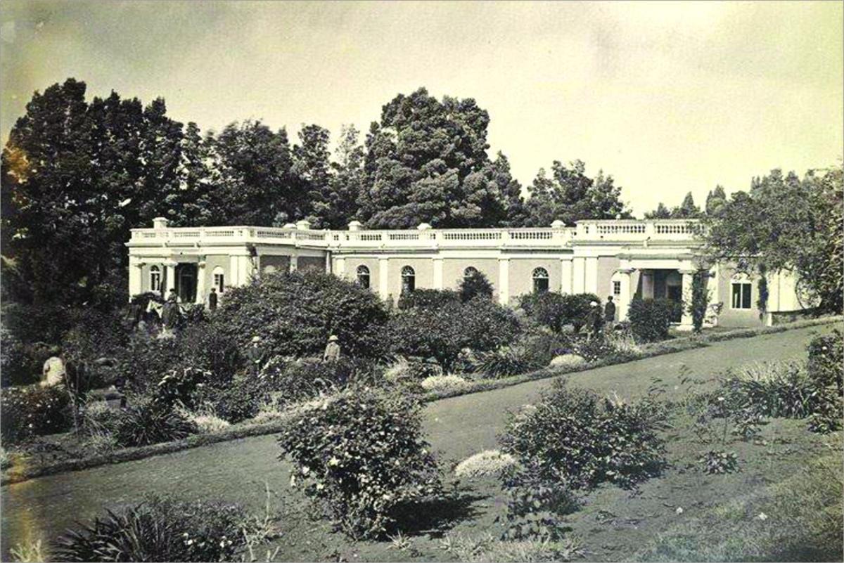 an old photo of a large white house at Savoy - IHCL SeleQtions in Ooty