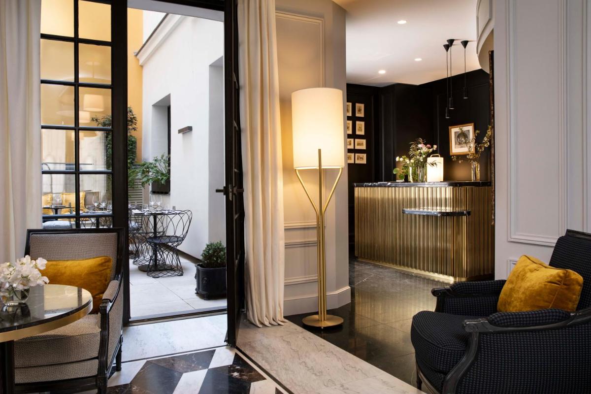 Coin salon dans l'établissement Le Damantin Hôtel & Spa
