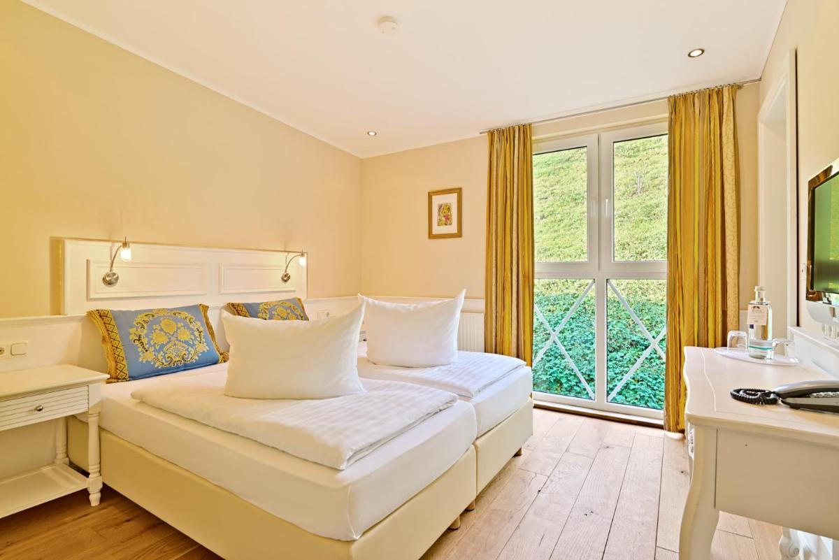 Hotel Weinberg-Schlößchen - Housity