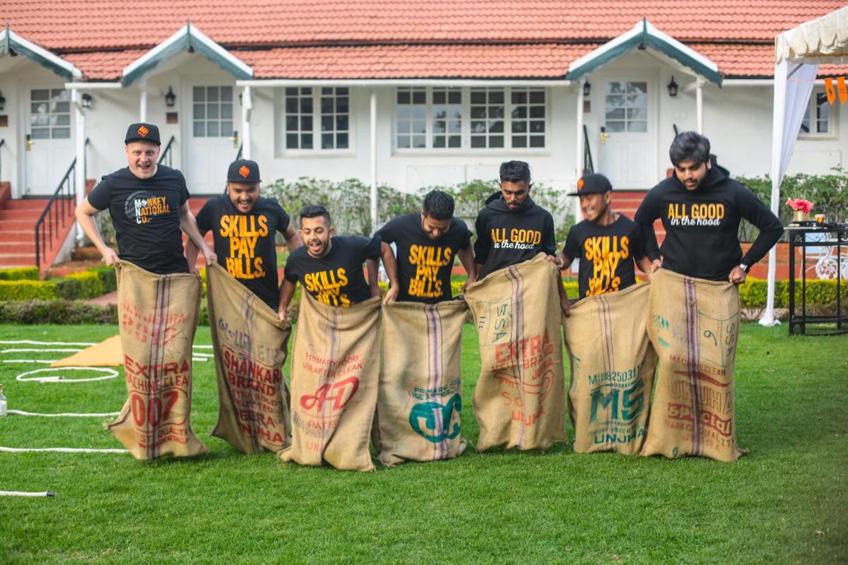 a group of men are standing in front of bags at Savoy - IHCL SeleQtions in Ooty