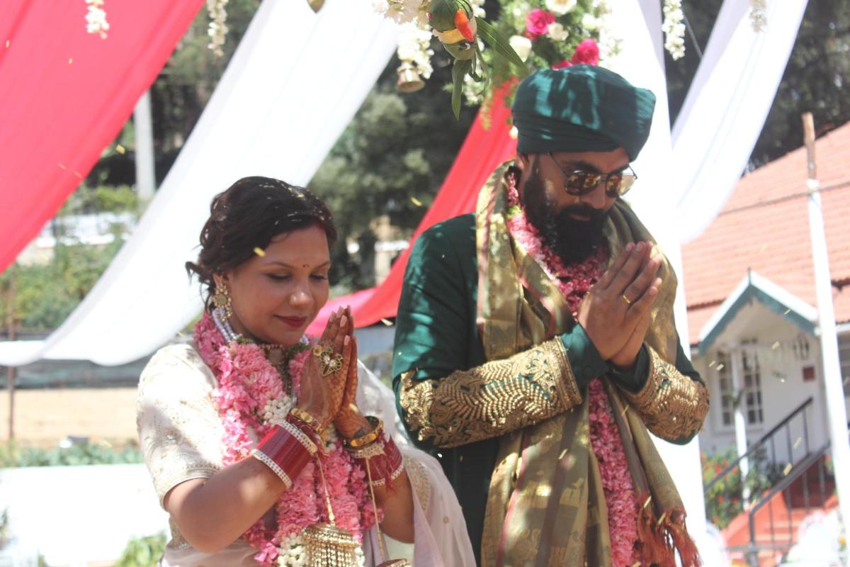 a man and a woman standing next to each other at Savoy - IHCL SeleQtions in Ooty