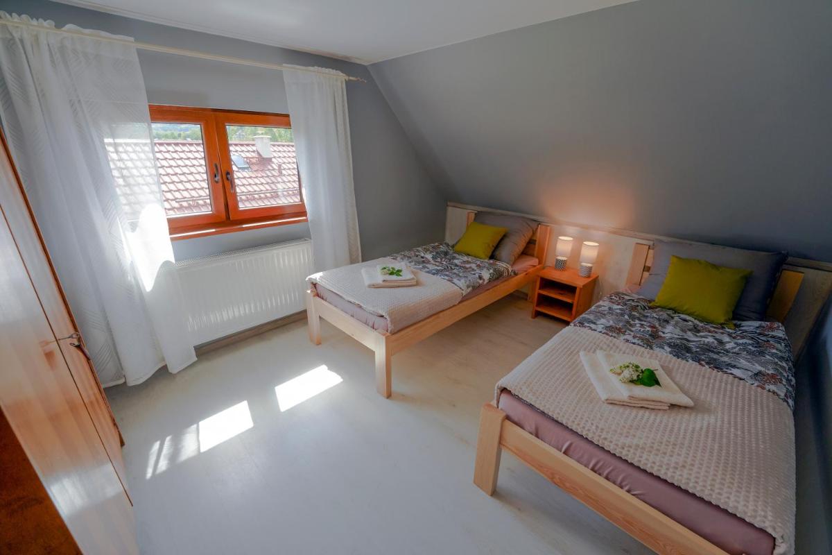 Chatka Czarny Bocian w Podgórzynie - Housity