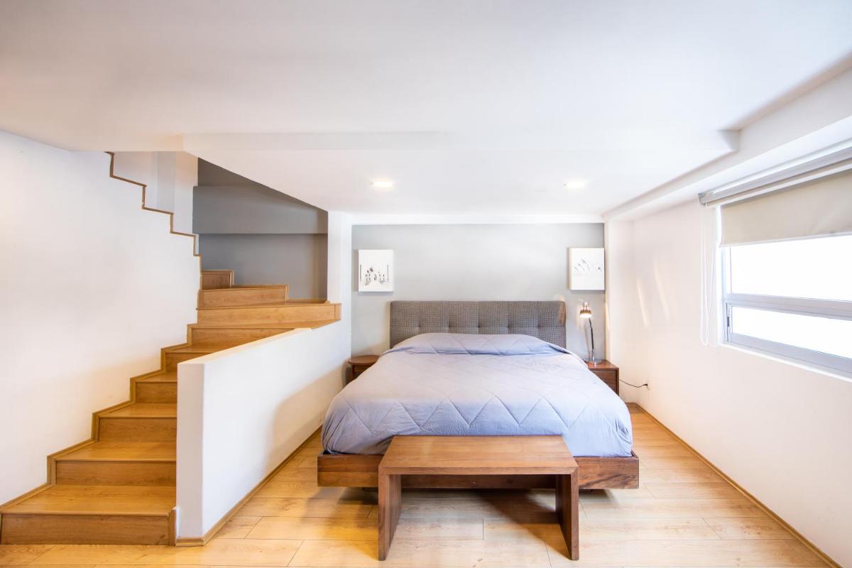 AO 301 - Classy Accents & Private Balcony in La Condesa - Housity