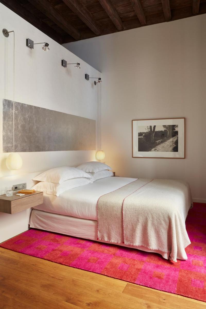 Cama o camas de una habitación en Hotel Neri – Relais & Chateaux