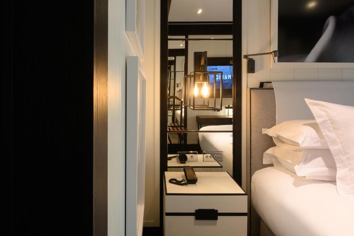 Cama o camas de una habitación en Seventy Barcelona