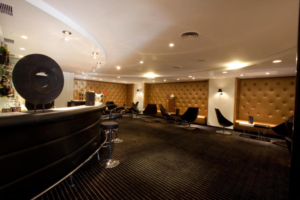 Coin salon dans l'établissement Hotel Palladia