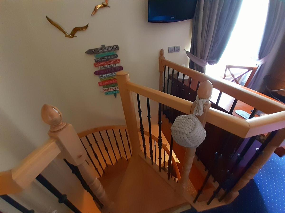 Télévision ou salle de divertissement dans l'établissement Châtellerie De Schoebeque