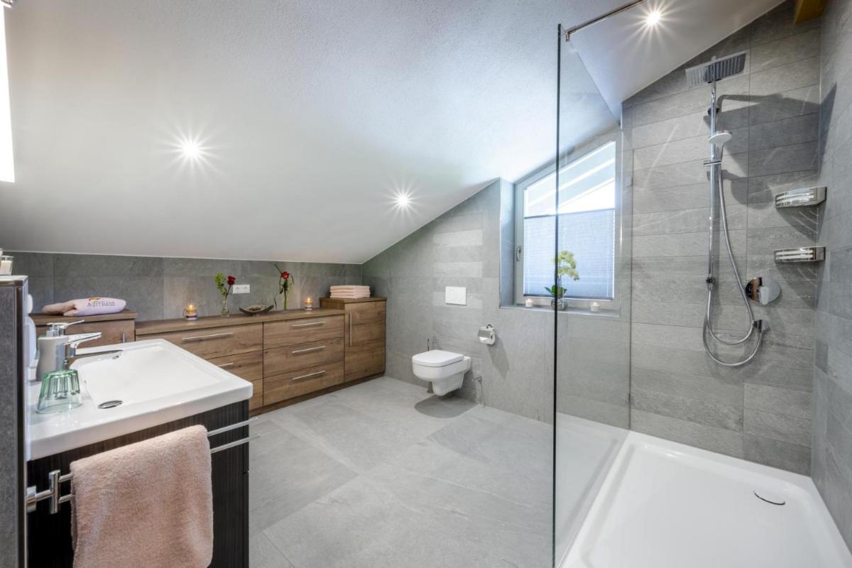 Ein Badezimmer in der Unterkunft Alpenglühn Apartments - Adult Only