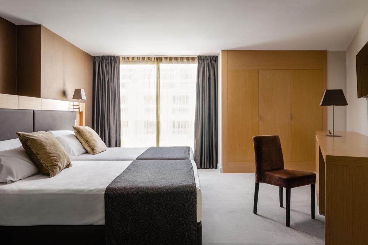 Cama o camas de una habitación en Gran Palas Hotel - Spa incluido