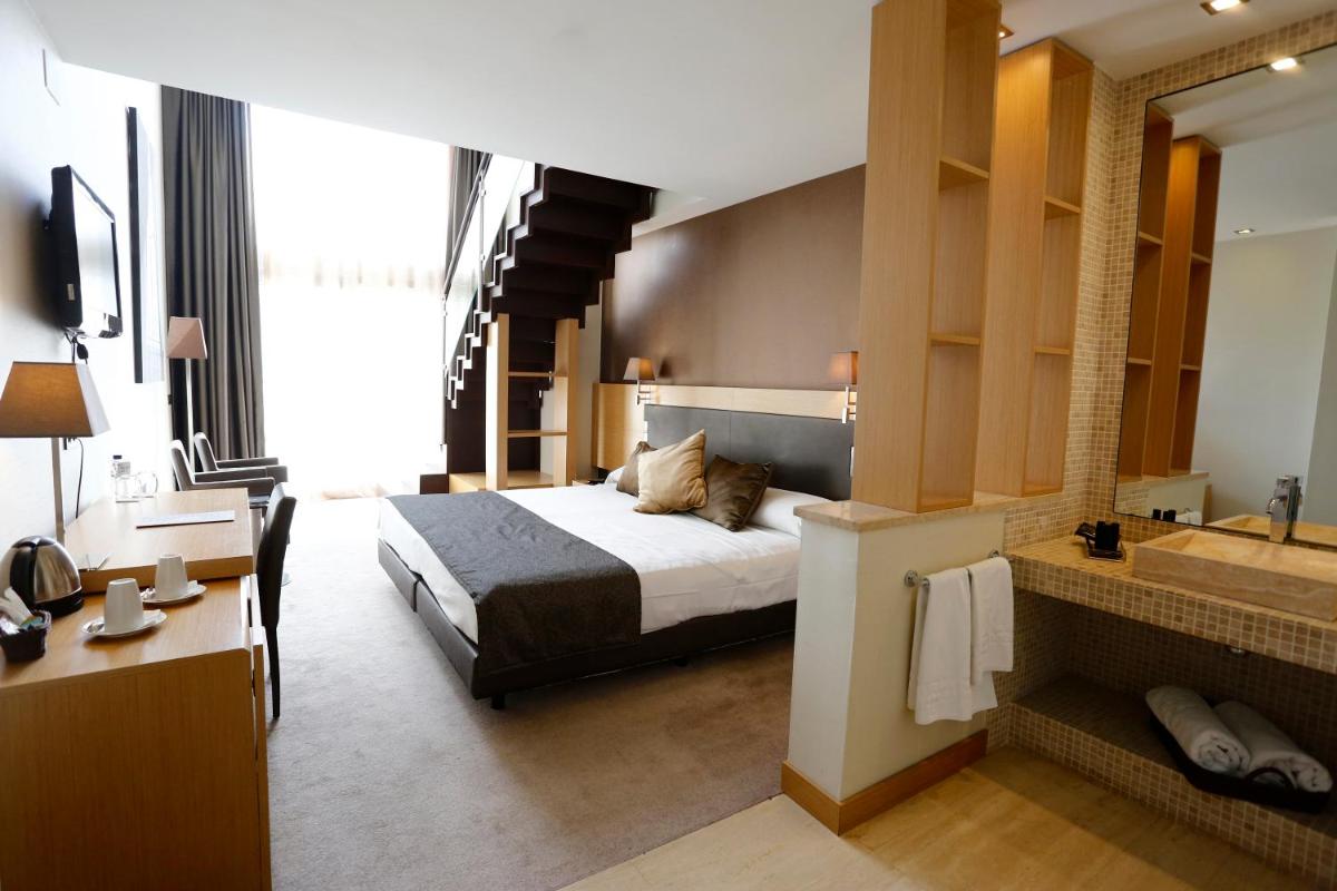 Cama o camas de una habitación en Gran Palas Hotel - Spa incluido
