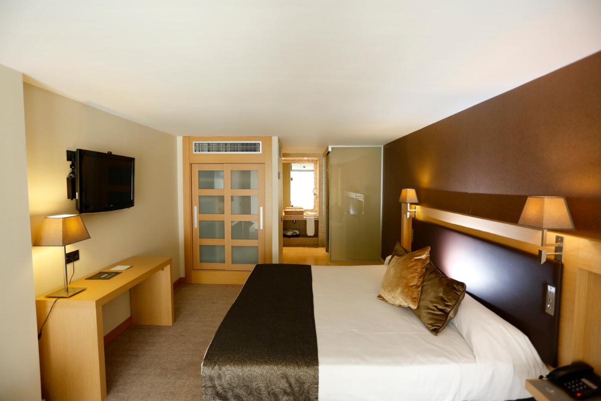 Cama o camas de una habitación en Gran Palas Hotel - Spa incluido