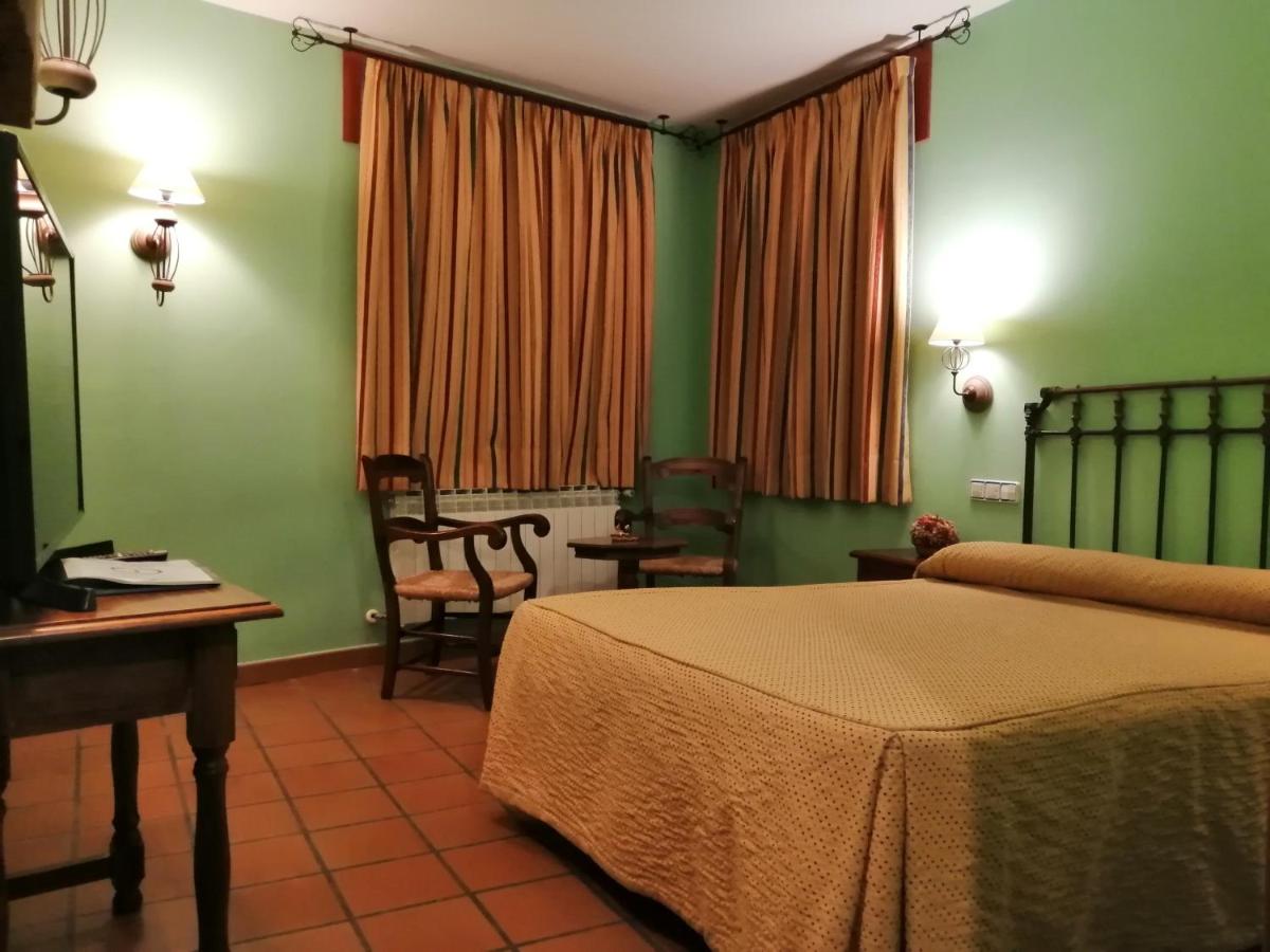 Cama o camas de una habitación en Hotel Rural & SPA Puente del Duratón