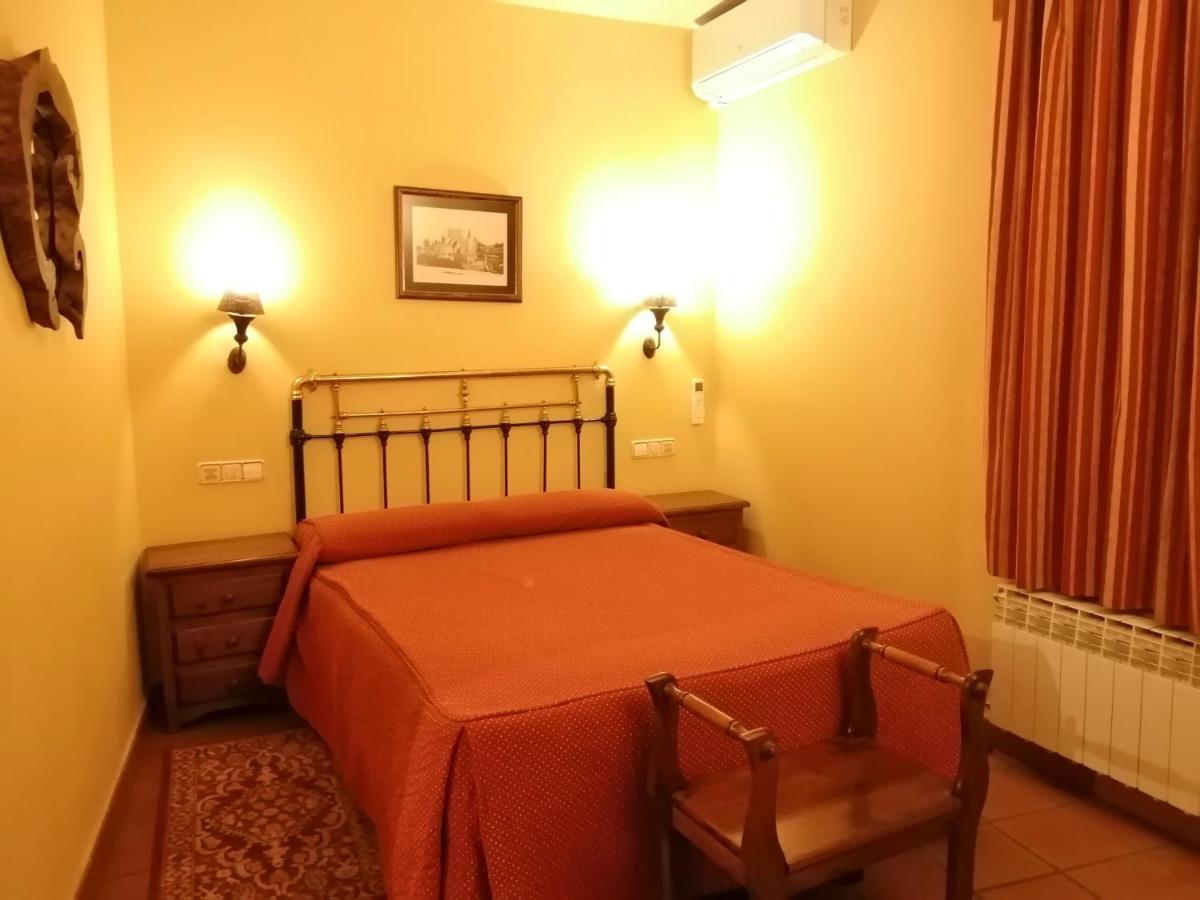 Cama o camas de una habitación en Hotel Rural & SPA Puente del Duratón