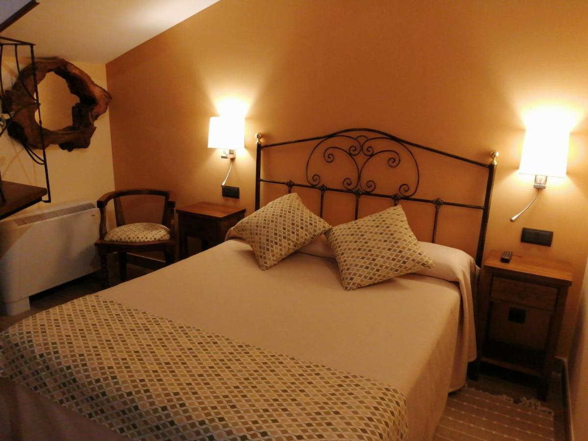 Cama o camas de una habitación en Hotel Rural & SPA Puente del Duratón