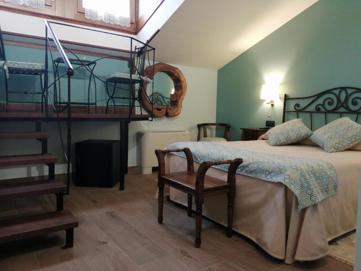 Cama o camas de una habitación en Hotel Rural & SPA Puente del Duratón