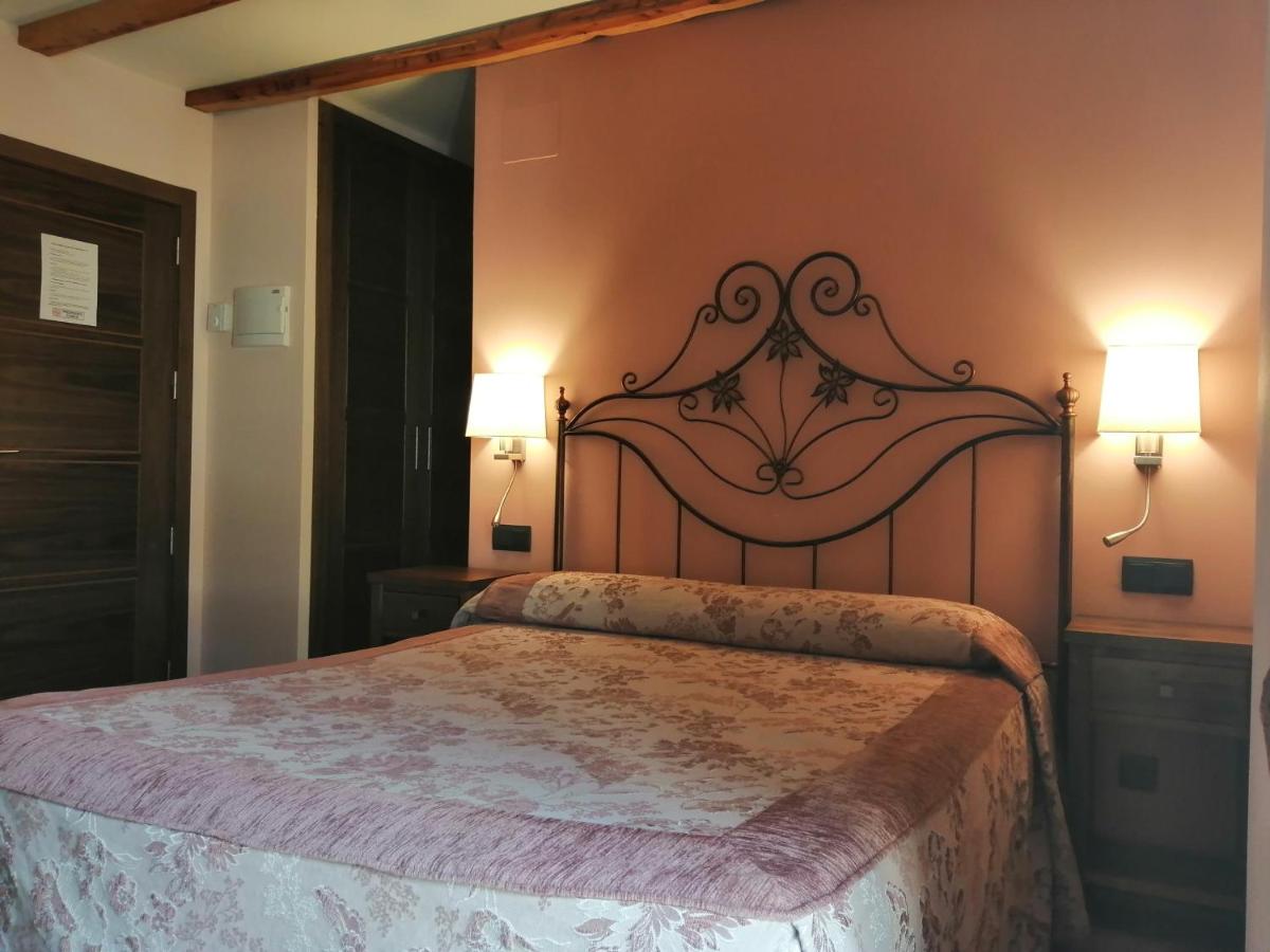 Cama o camas de una habitación en Hotel Rural & SPA Puente del Duratón