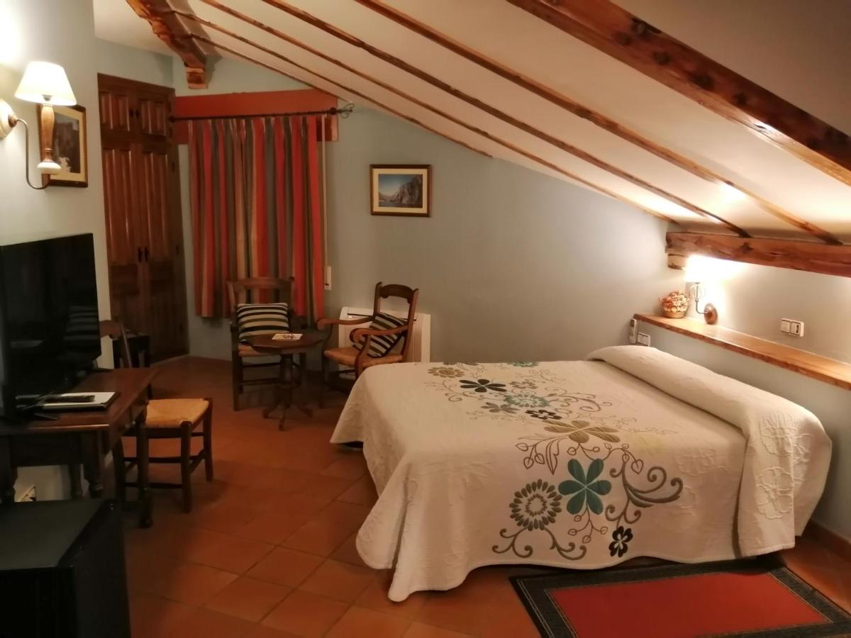 Cama o camas de una habitación en Hotel Rural & SPA Puente del Duratón