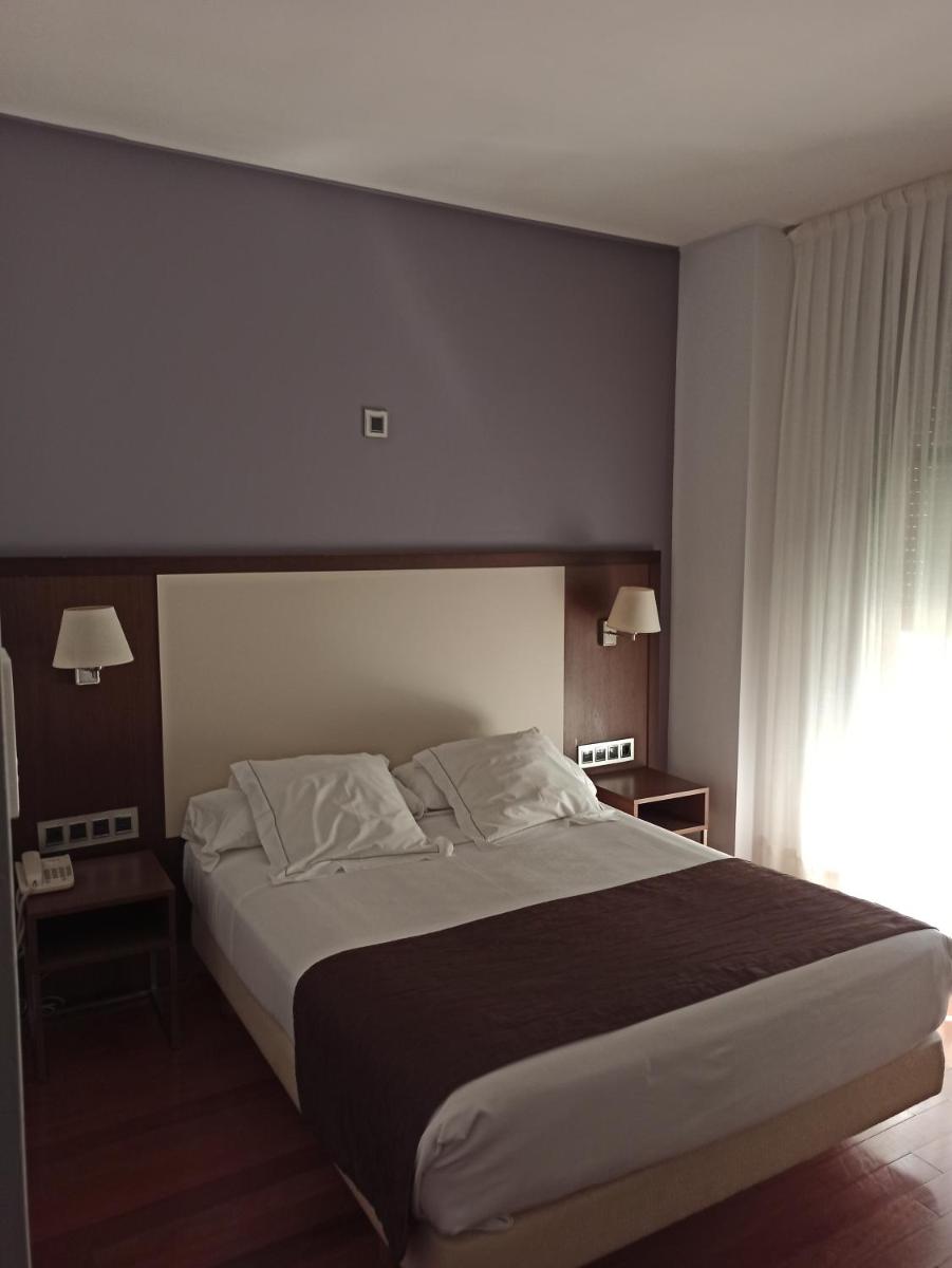 Cama o camas de una habitación en ARVA Spa París