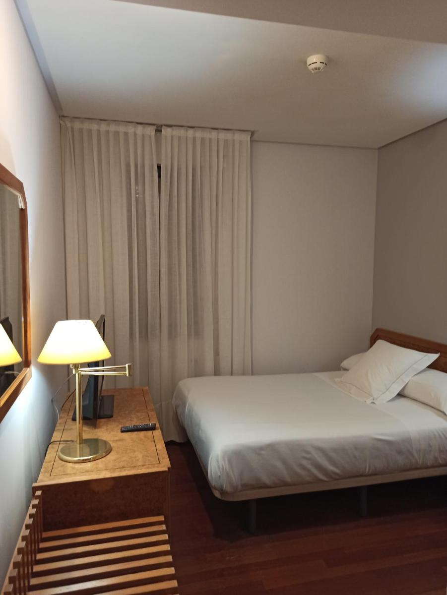 Cama o camas de una habitación en ARVA Spa París