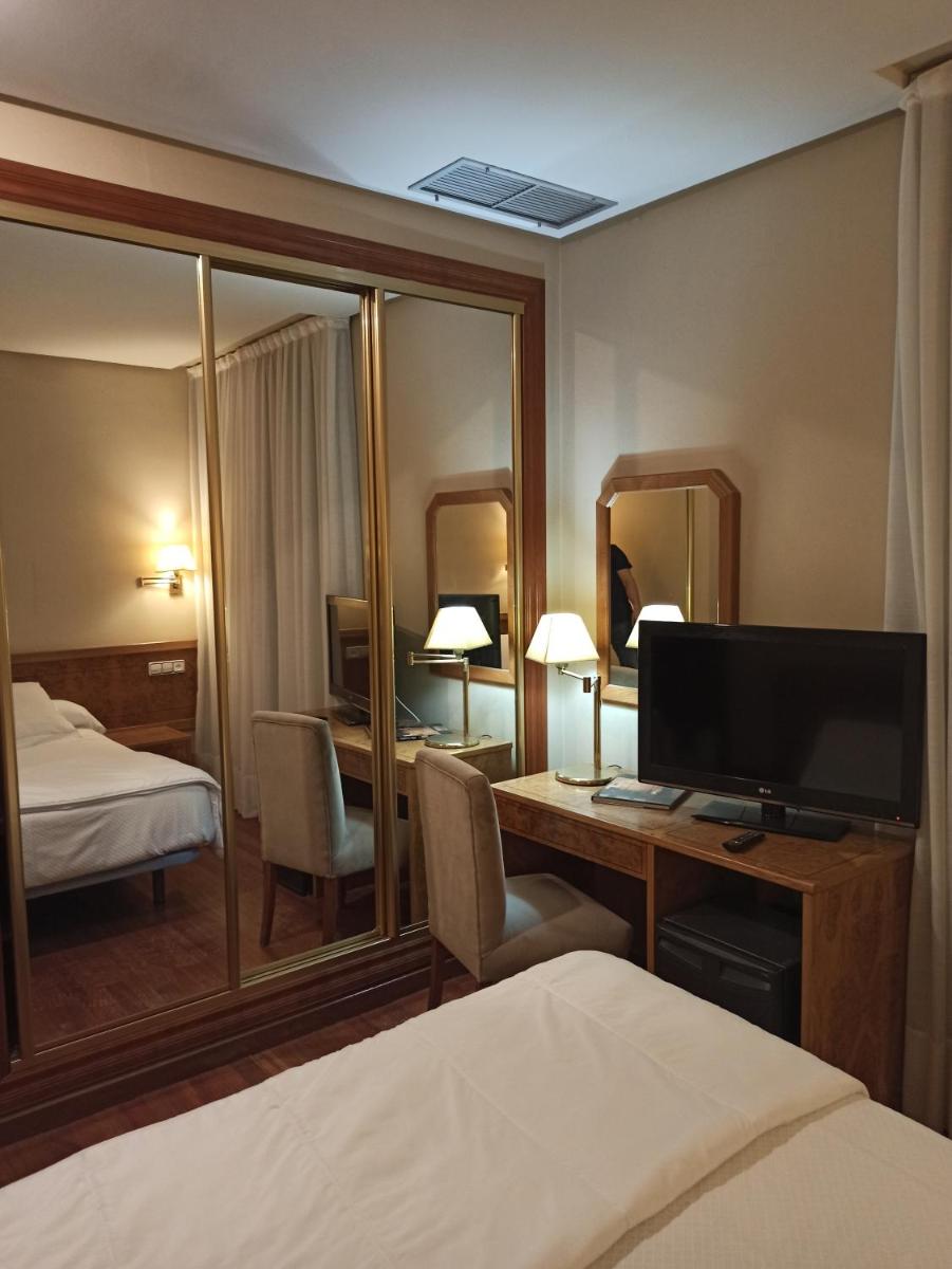 Cama o camas de una habitación en ARVA Spa París