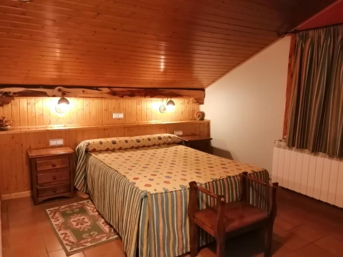 Cama o camas de una habitación en Hotel Rural & SPA Puente del Duratón